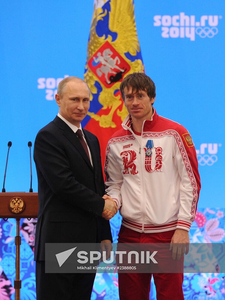 Vladimir Putin during award ceremony for Russian Olympic medalists in Sochi