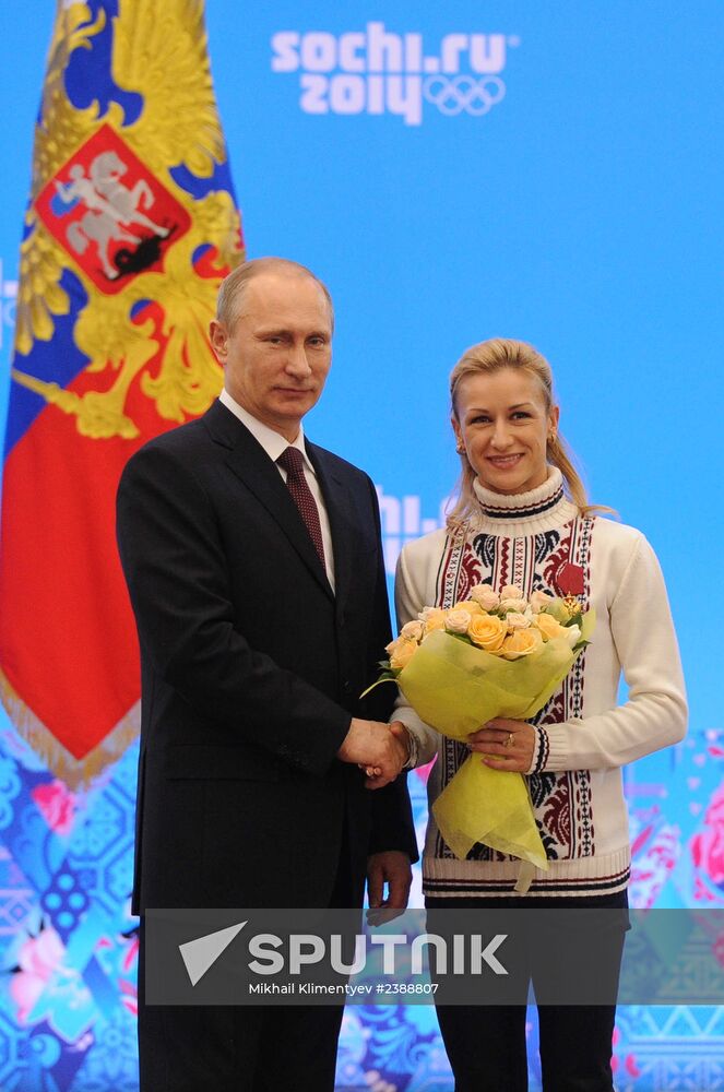 Vladimir Putin during award ceremony for Russian Olympic medalists in Sochi
