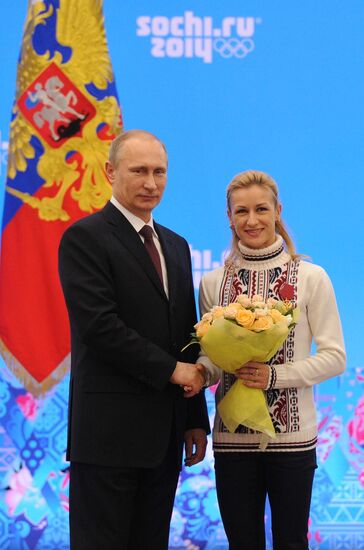 Vladimir Putin during award ceremony for Russian Olympic medalists in Sochi
