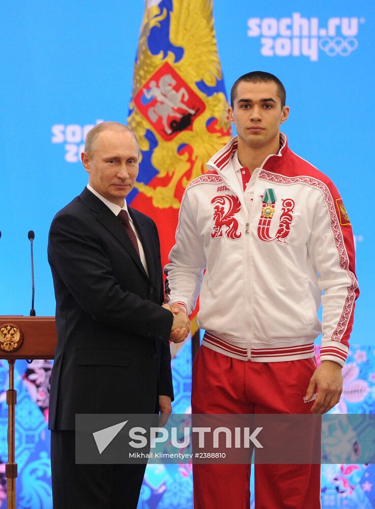 Vladimir Putin during award ceremony for Russian Olympic medalists in Sochi