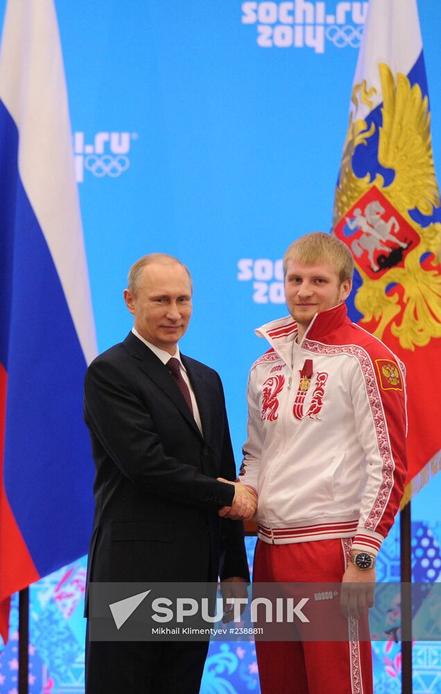 Vladimir Putin during award ceremony for Russian Olympic medalists in Sochi