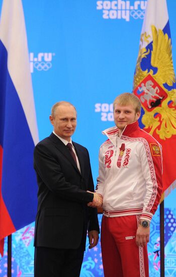 Vladimir Putin during award ceremony for Russian Olympic medalists in Sochi