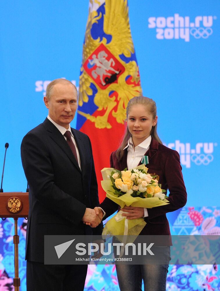 Vladimir Putin during award ceremony for Russian Olympic medalists in Sochi