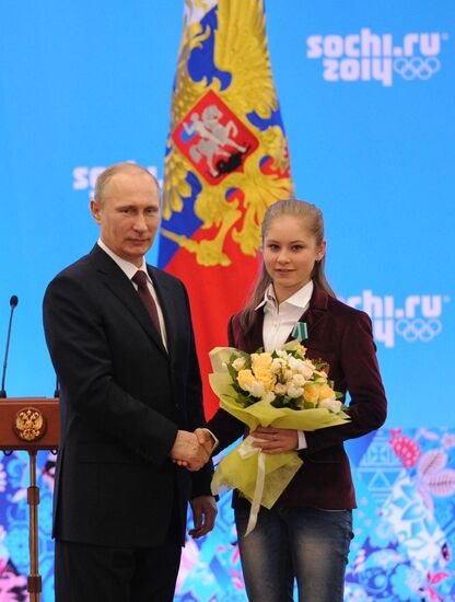 Vladimir Putin during award ceremony for Russian Olympic medalists in Sochi