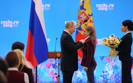 Vladimir Putin during award ceremony for Russian Olympic medalists in Sochi