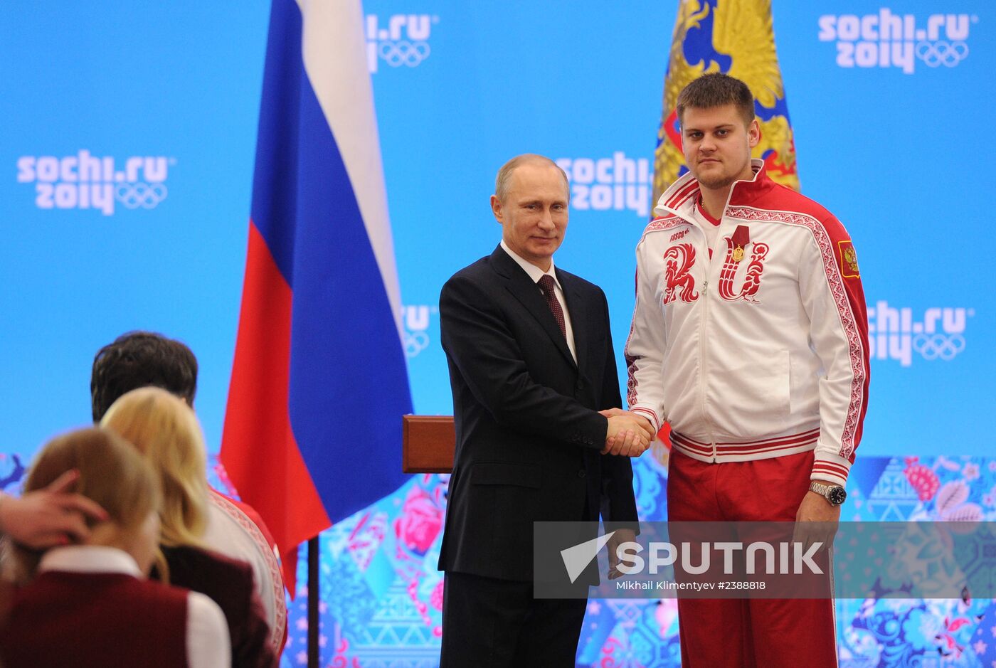 Vladimir Putin during award ceremony for Russian Olympic medalists in Sochi
