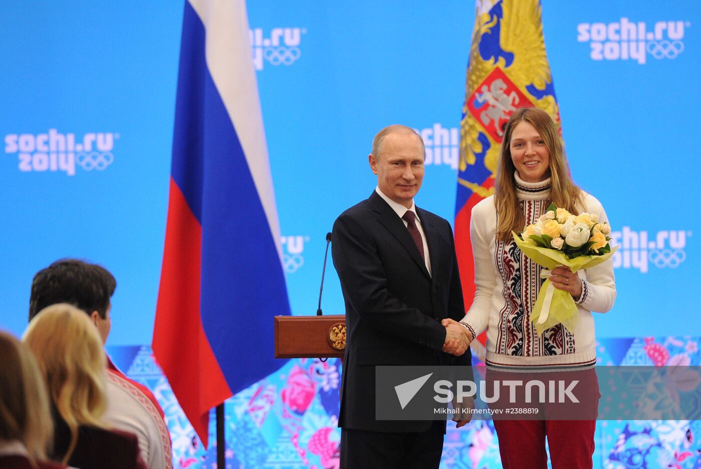 Vladimir Putin during award ceremony for Russian Olympic medalists in Sochi