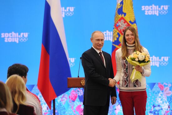 Vladimir Putin during award ceremony for Russian Olympic medalists in Sochi