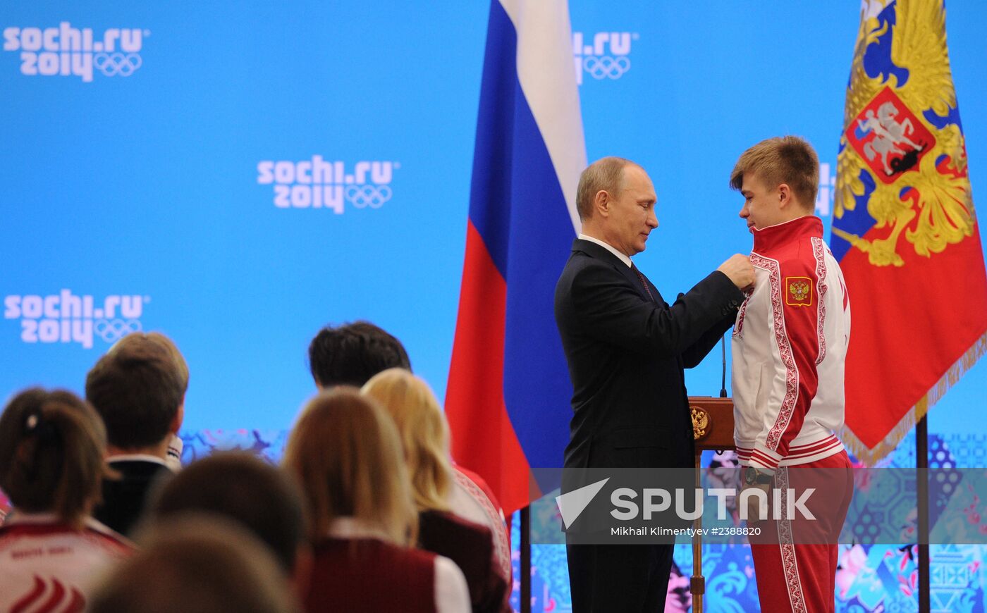 Vladimir Putin during award ceremony for Russian Olympic medalists in Sochi