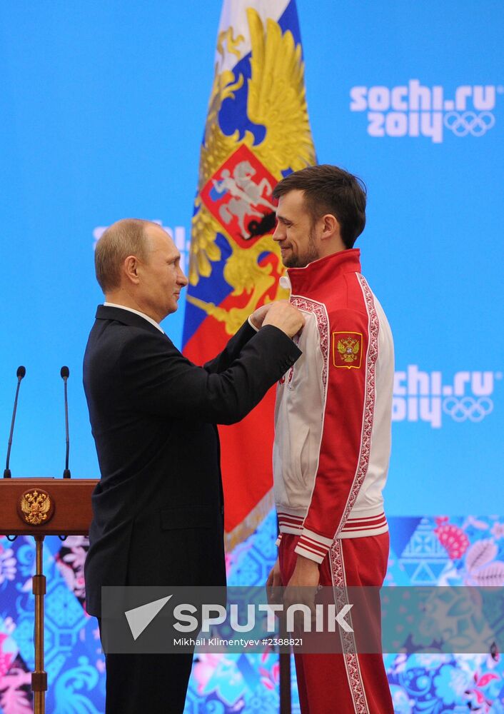 Vladimir Putin during award ceremony for Russian Olympic medalists in Sochi