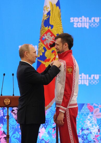 Vladimir Putin during award ceremony for Russian Olympic medalists in Sochi