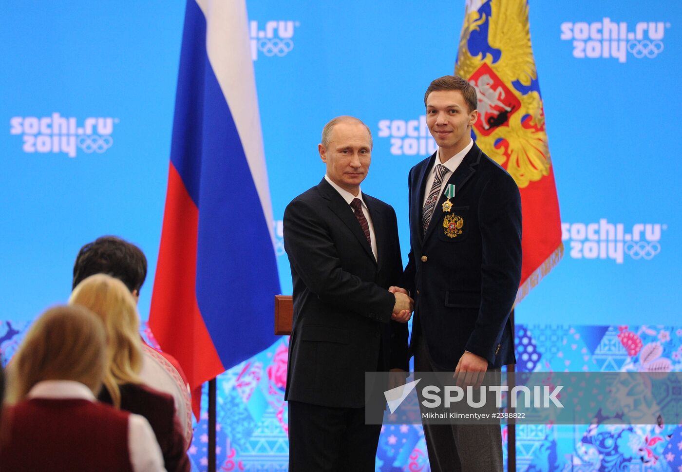 Vladimir Putin during award ceremony for Russian Olympic medalists in Sochi