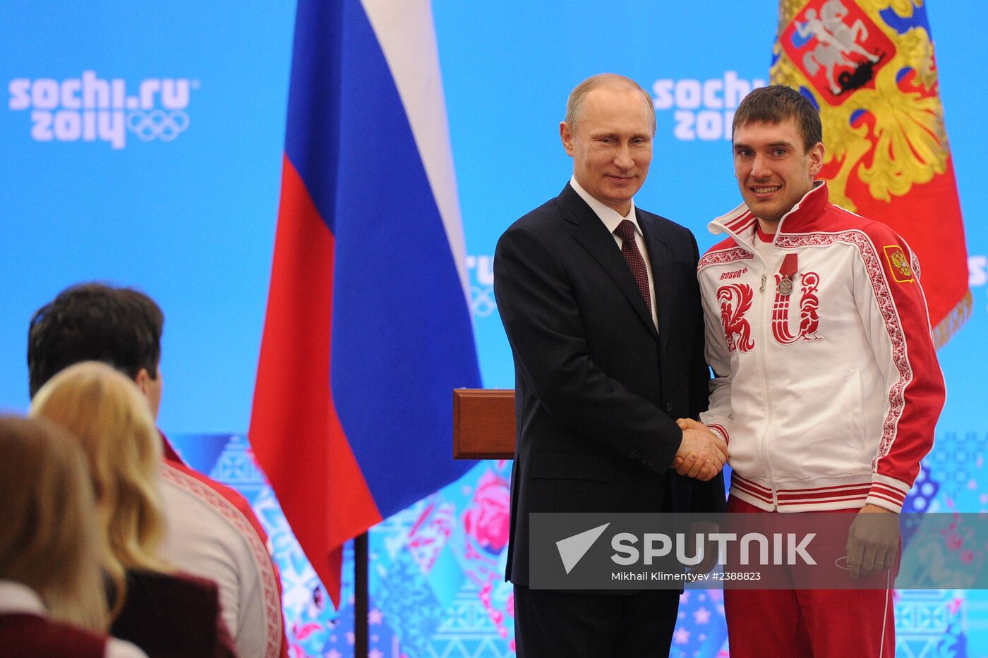 Vladimir Putin during award ceremony for Russian Olympic medalists in Sochi