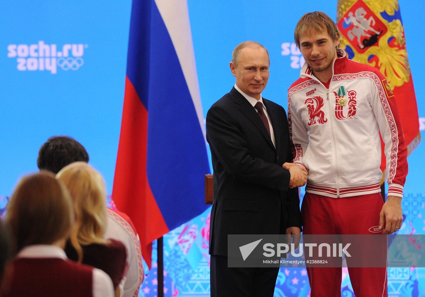 Vladimir Putin during award ceremony for Russian Olympic medalists in Sochi