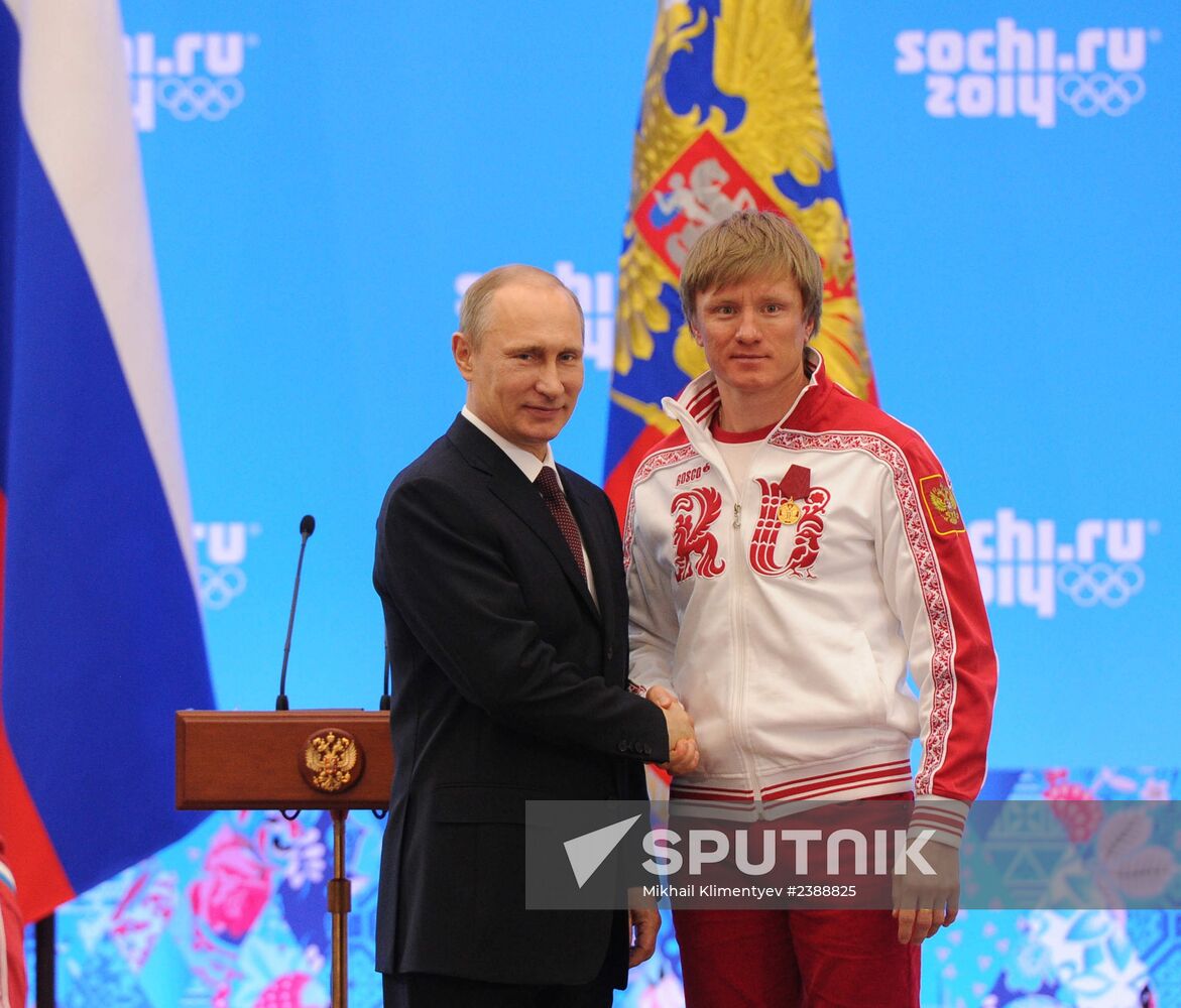 Vladimir Putin during award ceremony for Russian Olympic medalists in Sochi