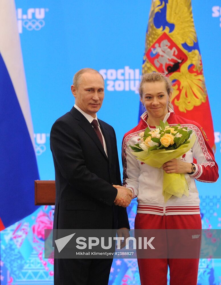 Vladimir Putin during award ceremony for Russian Olympic medalists in Sochi