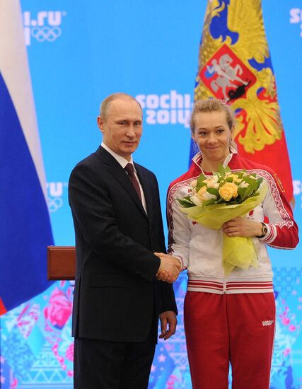 Vladimir Putin during award ceremony for Russian Olympic medalists in Sochi