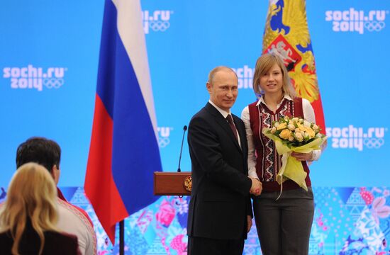 Vladimir Putin during award ceremony for Russian Olympic medalists in Sochi