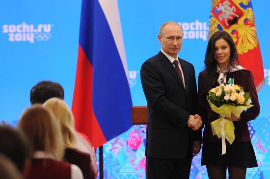 Vladimir Putin during award ceremony for Russian Olympic medalists in Sochi