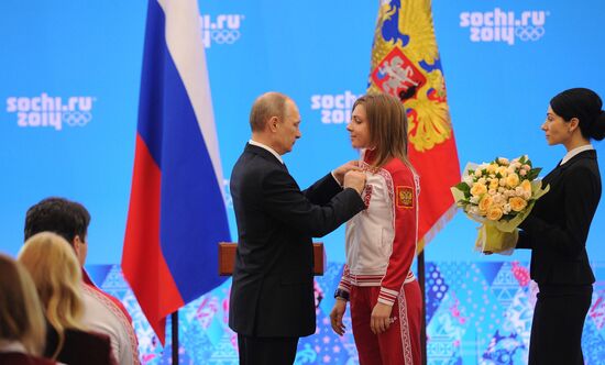 Vladimir Putin during award ceremony for Russian Olympic medalists in Sochi