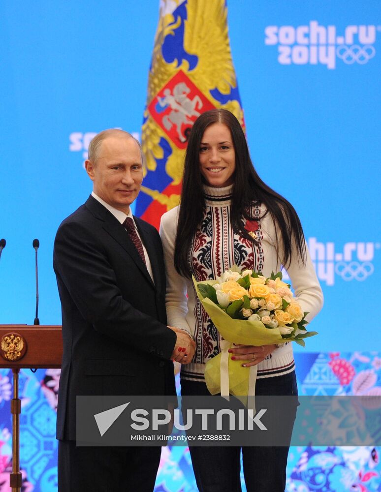 Vladimir Putin during award ceremony for Russian Olympic medalists in Sochi