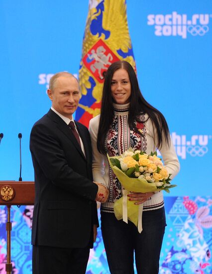 Vladimir Putin during award ceremony for Russian Olympic medalists in Sochi