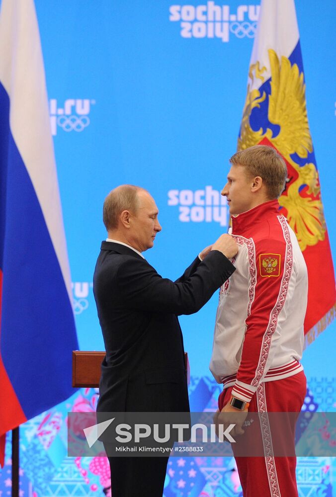 Vladimir Putin during award ceremony for Russian Olympic medalists in Sochi