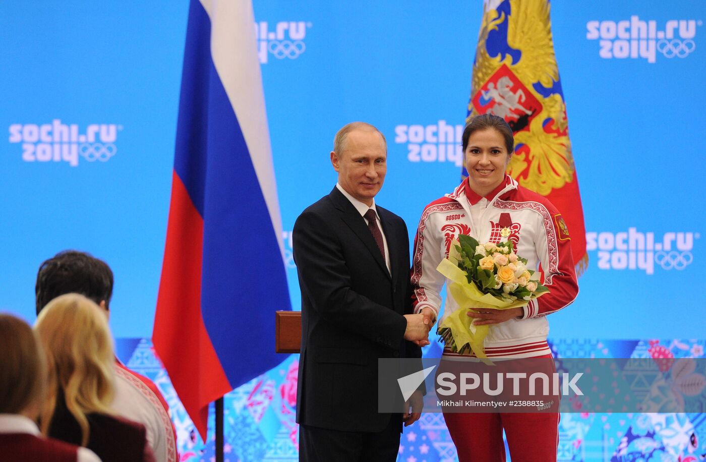 Vladimir Putin during award ceremony for Russian Olympic medalists in Sochi