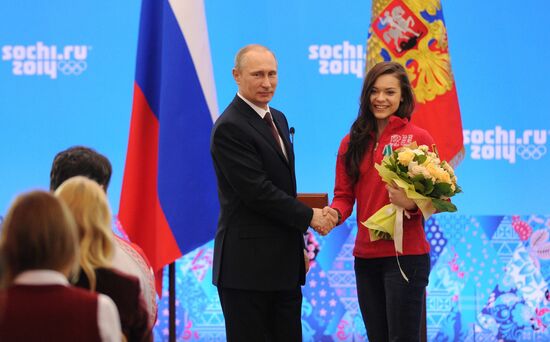 Vladimir Putin during award ceremony for Russian Olympic medalists in Sochi