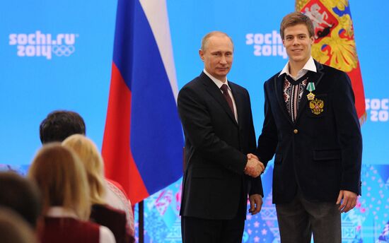 Vladimir Putin during award ceremony for Russian Olympic medalists in Sochi