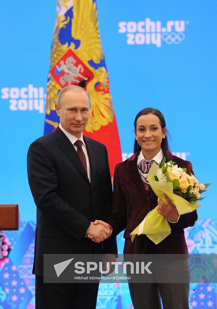 Vladimir Putin during award ceremony for Russian Olympic medalists in Sochi