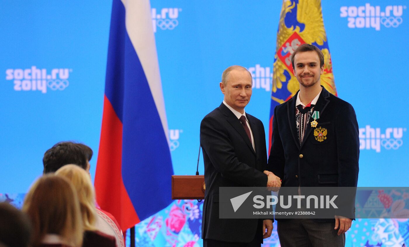 Vladimir Putin during award ceremony for Russian Olympic medalists in Sochi