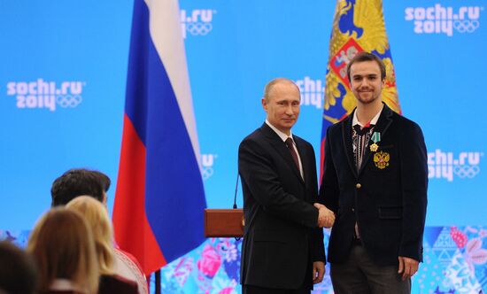 Vladimir Putin during award ceremony for Russian Olympic medalists in Sochi