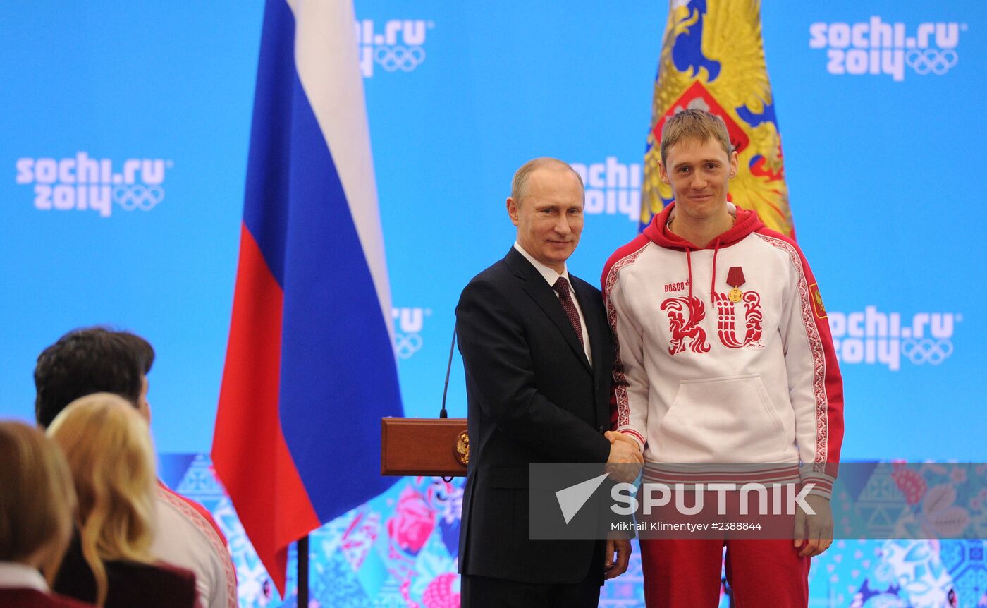 Vladimir Putin during award ceremony for Russian Olympic medalists in Sochi