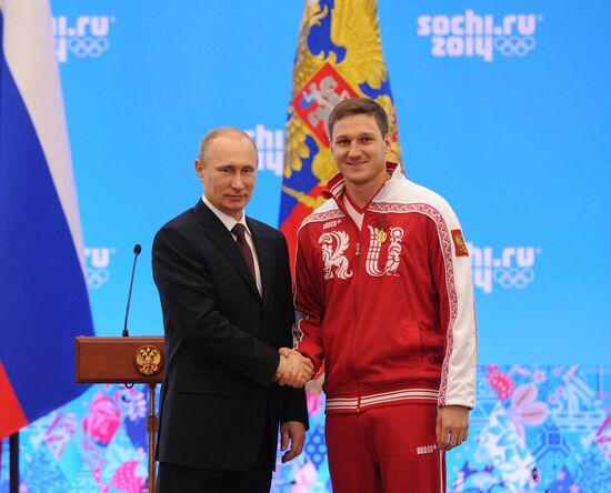 Vladimir Putin during award ceremony for Russian Olympic medalists in Sochi