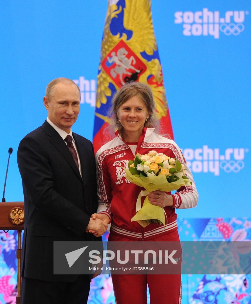 Vladimir Putin during award ceremony for Russian Olympic medalists in Sochi