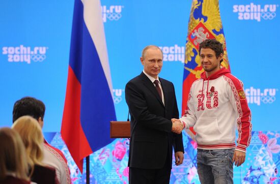 Vladimir Putin during award ceremony for Russian Olympic medalists in Sochi