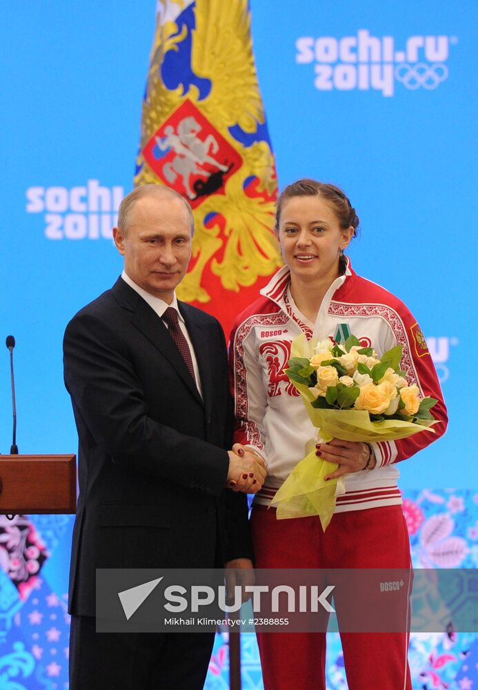 Vladimir Putin during award ceremony for Russian Olympic medalists in Sochi