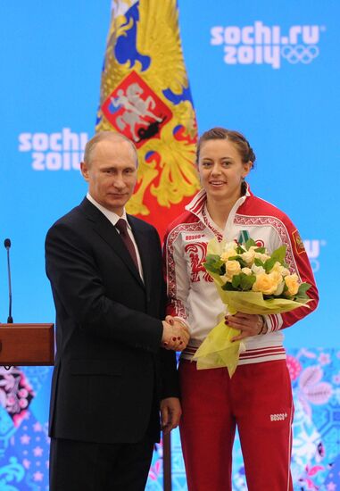 Vladimir Putin during award ceremony for Russian Olympic medalists in Sochi