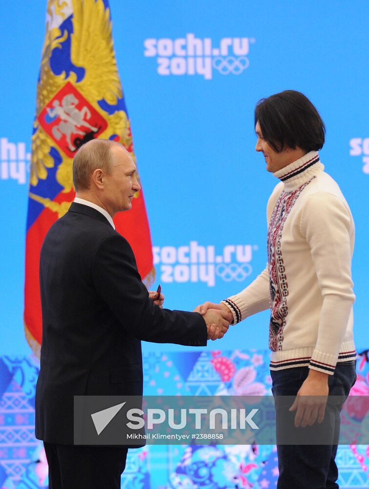 Vladimir Putin during award ceremony for Russian Olympic medalists in Sochi