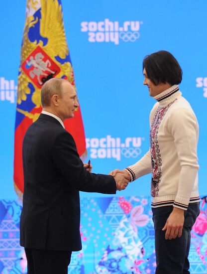 Vladimir Putin during award ceremony for Russian Olympic medalists in Sochi