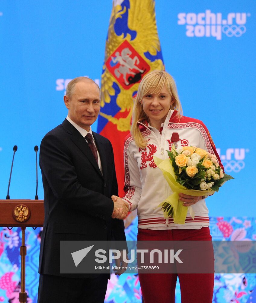 Vladimir Putin during award ceremony for Russian Olympic medalists in Sochi
