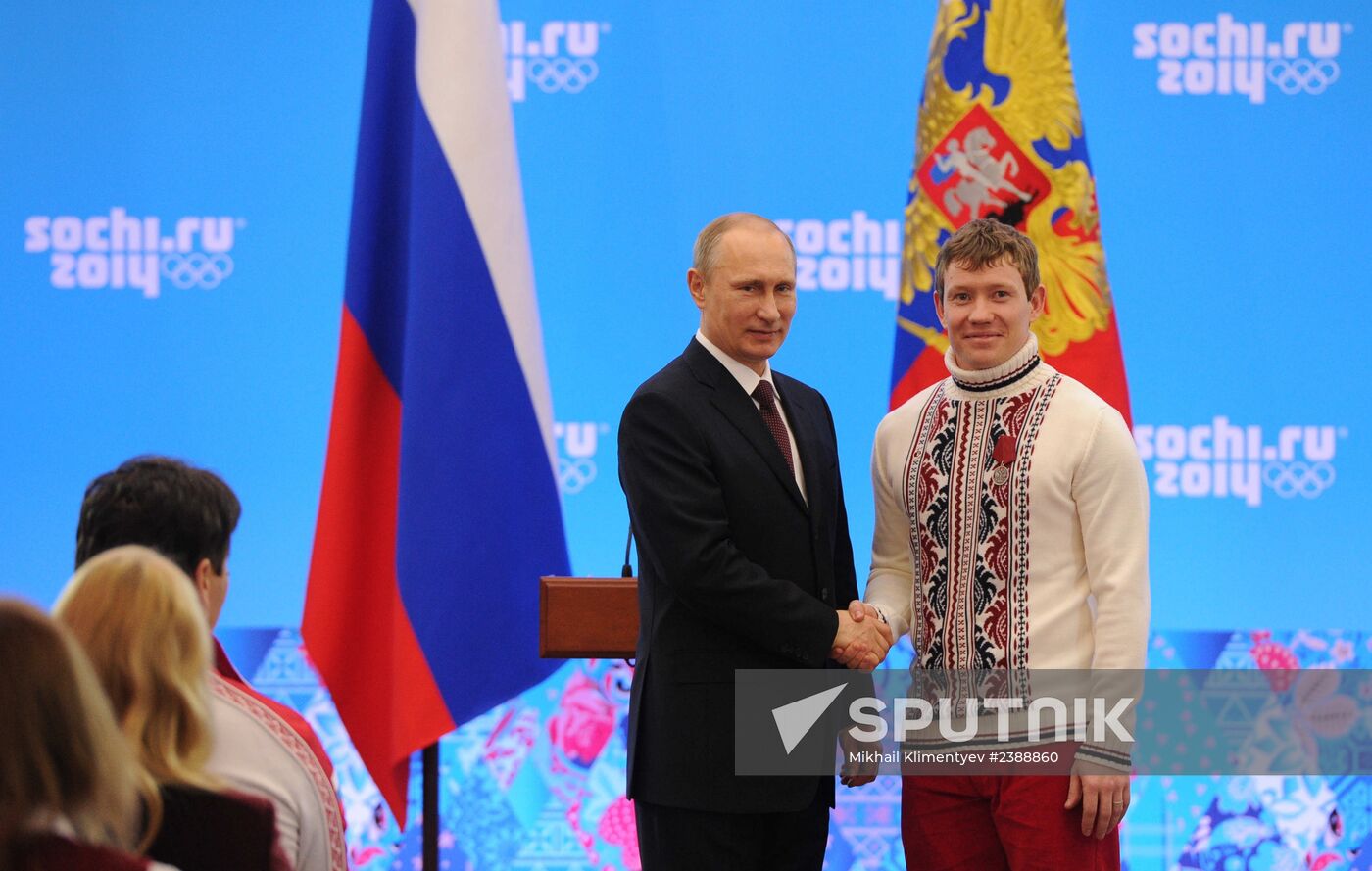 Vladimir Putin during award ceremony for Russian Olympic medalists in Sochi