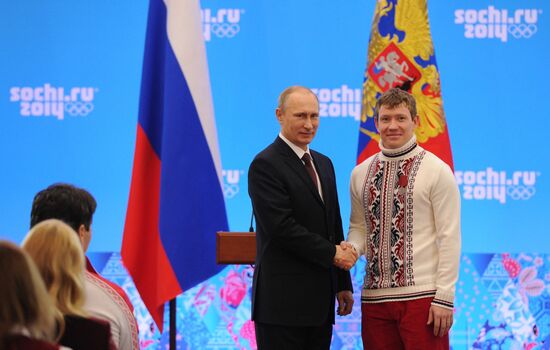 Vladimir Putin during award ceremony for Russian Olympic medalists in Sochi