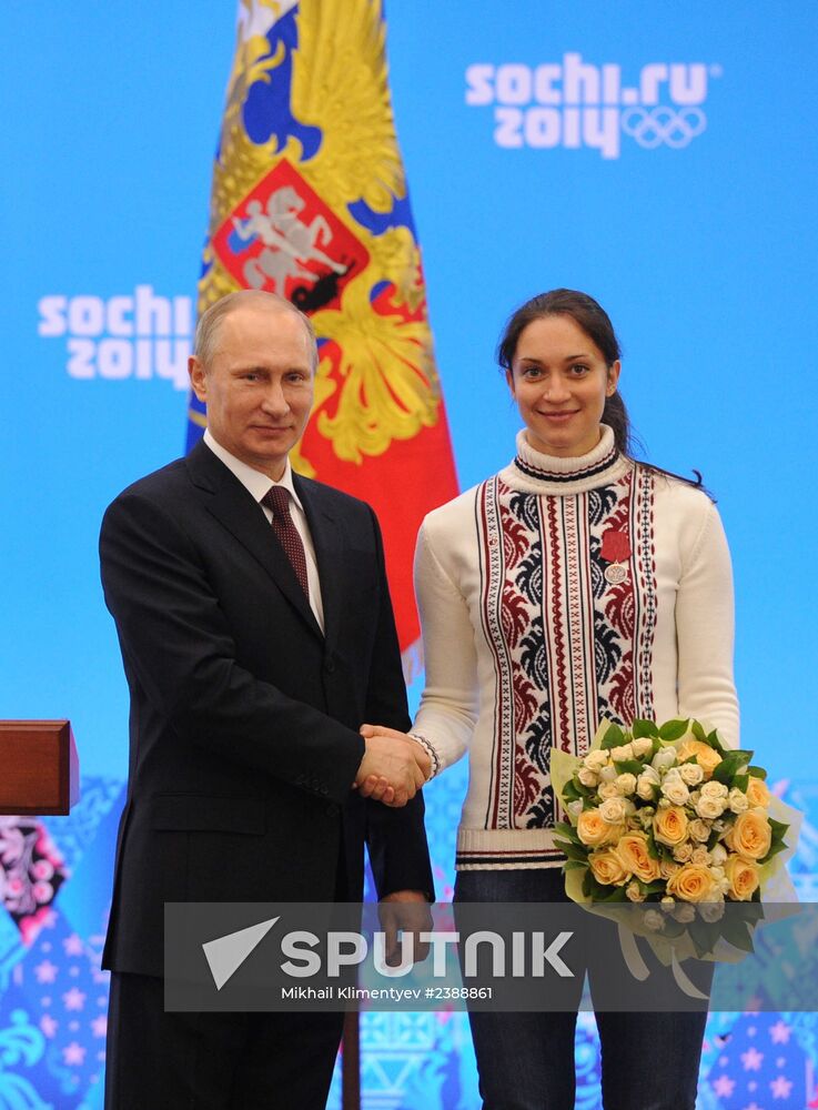 Vladimir Putin during award ceremony for Russian Olympic medalists in Sochi