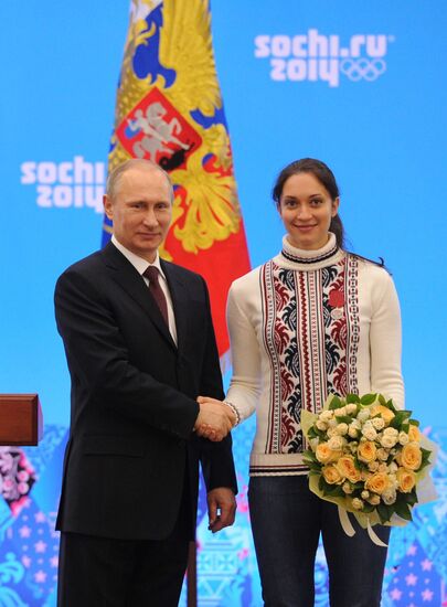 Vladimir Putin during award ceremony for Russian Olympic medalists in Sochi