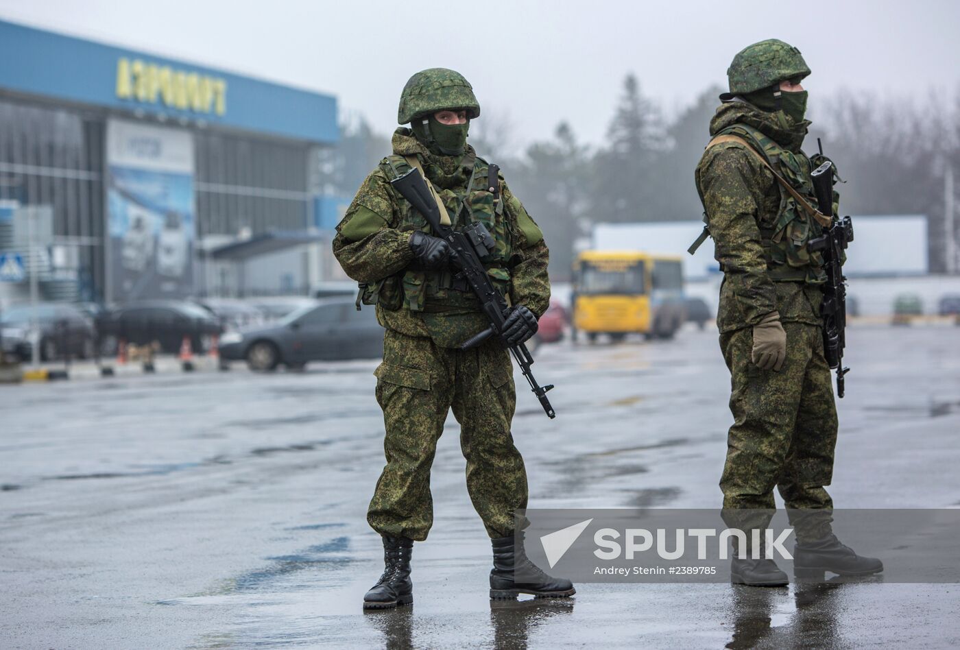 Armed people outside Simferopol airport
