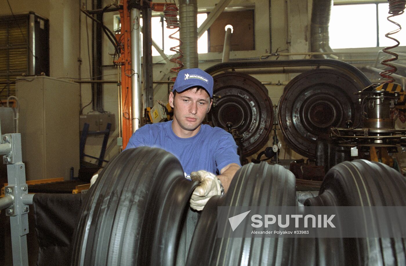 WORKER TIRES PLANT