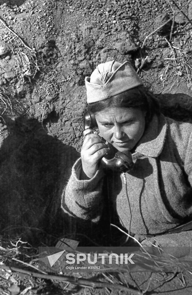 Frontline telephone operator in a trench