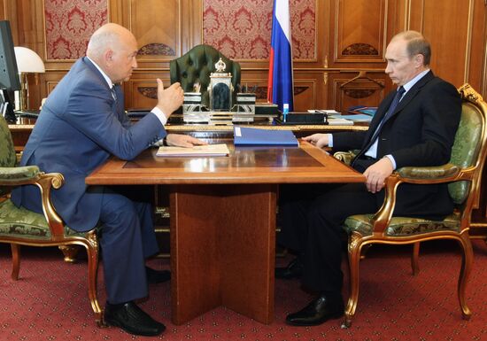 Vladimir Putin and Yury Luzhkov